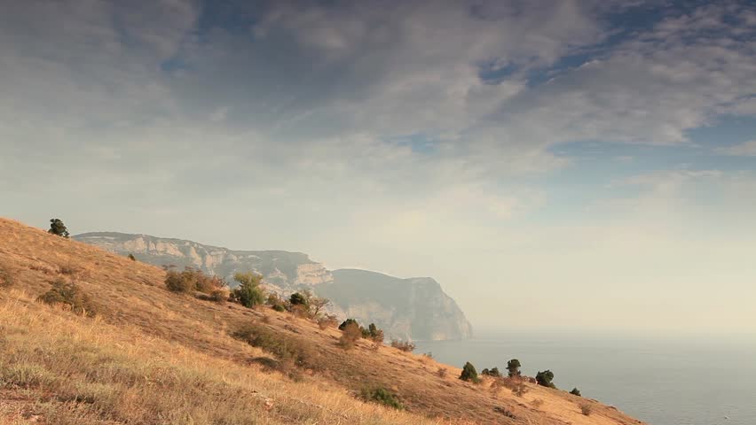 Cloudy sky over the mountains and the sea. Balaklava, Crimea, Ukraine
