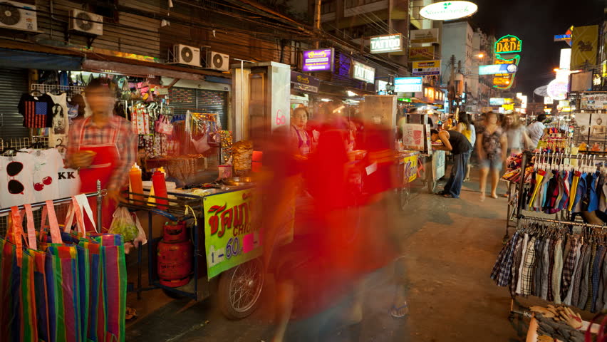 BANGKOK - NOV 20: timelapse view of food vendors on Khao San Road at night on 20 November 2011 in Bangkok Thailand