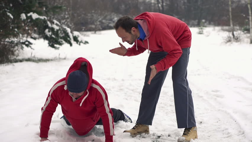 Man doing pushups with aggressive trainer, super slow motion, shot at 240fps
