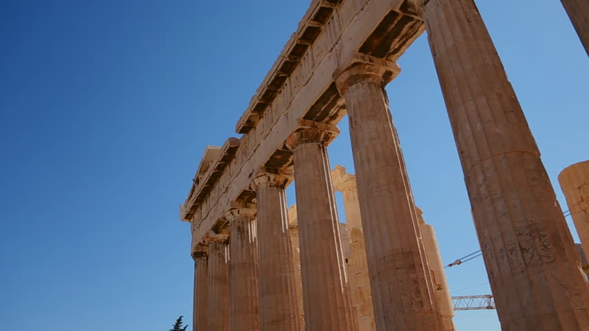ATHENS, GREECE 2012 Low angle pan of the columns of the Acropolis and Parthenon on the hilltop in Athens, Greece.