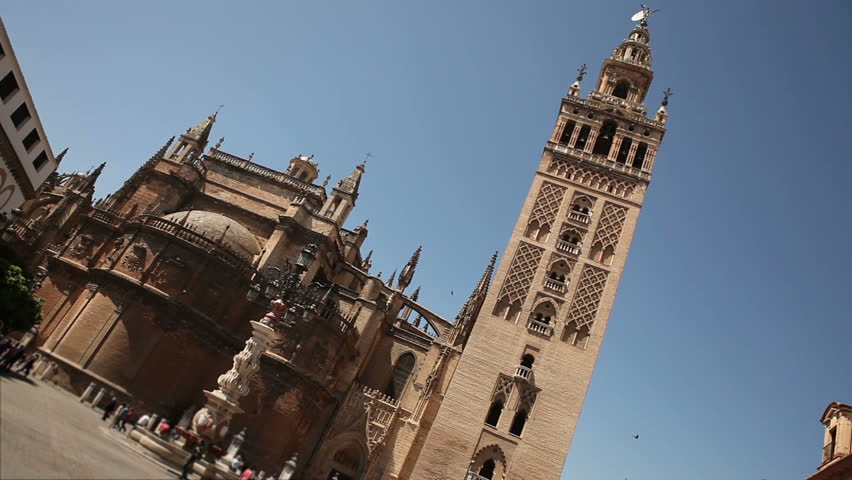 View of the famous Seville mosche with its Giralda minaret in a typical day