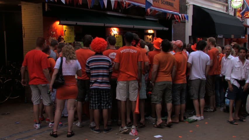 GRONINGEN, HOLLAND - JULY 11: Dutch soccer fans supporting their team during the final of the FIFA World Cup 2010 Netherlands vs. Spain - July 11, 2010 in Groningen, the Netherlands.