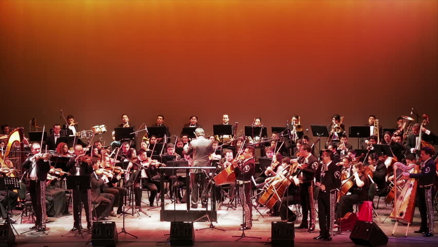 MEXICO, GUANAJUATO - CIRCA OCTOBER 2012: Symphonic orchestra concert by night and stage illuminated during the Cervantino Cultural Festival