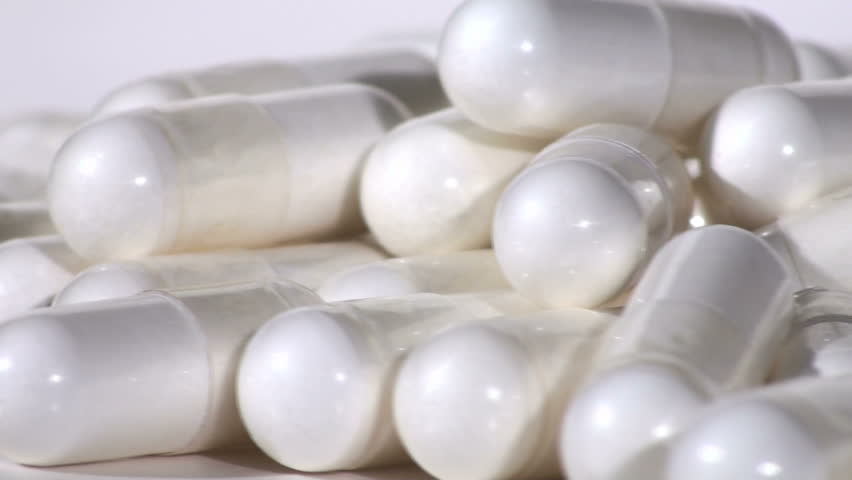 White Pills Medicine close-up LOOP