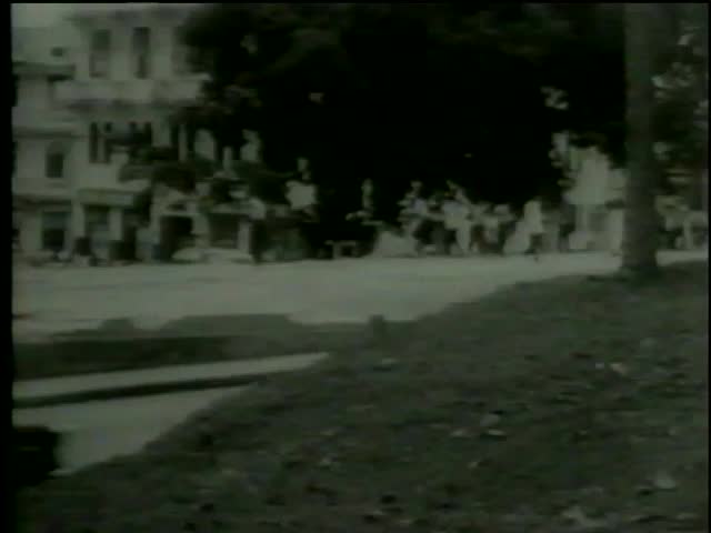 Soldiers throw smoke bombs at protesting panamanian students in the Canal Zone Panama circa 1964-MGM PICTURES, UNIVERSAL-INTERNATIONAL NEWSREEL, USA, filmed in 1964  