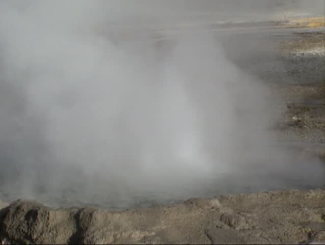 Eruption Cliff geyser, Black Sand Basin, Yellowstone National Park. Cliff Geyser has a cliff-like wall formed around the crater.