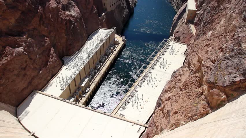 Hoover Dam, once known as Boulder Dam. Hoover Dam is a concrete arch-gravity dam in the Black Canyon of the Colorado River, on the border between the US states of Arizona and Nevada.