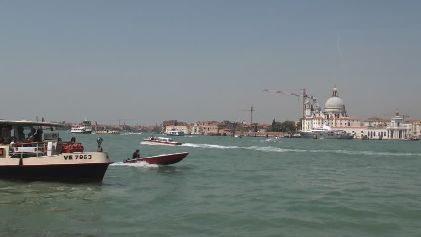 VENICE, ITALY - MAY 11: Public transport on the Canal of Venice on May 11, 2012. The Grand Canal flows in an S-shape through the central districts of the city and is the city's main traffic corridor.