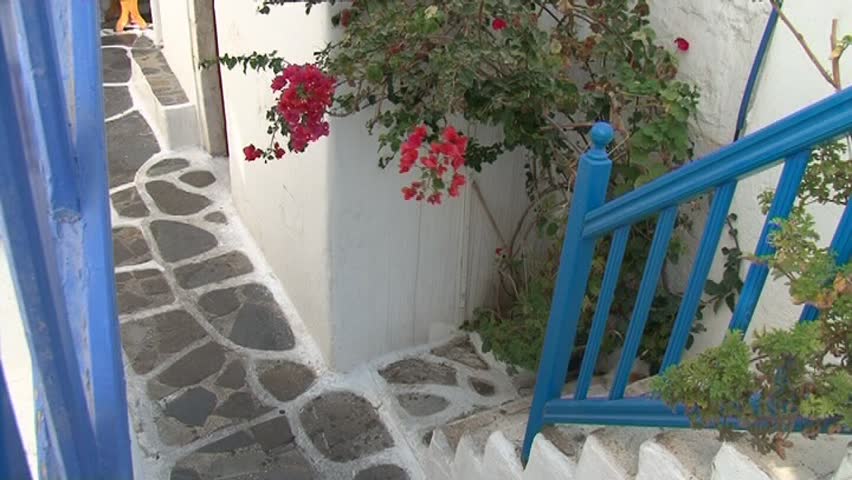 A typical narrow alley in the town of Mykonos, Greece