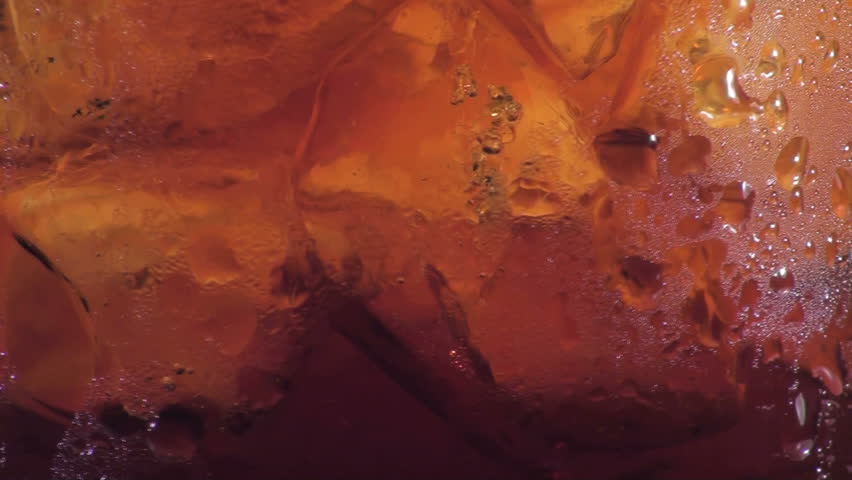 beverage poured into glass - MACRO HD