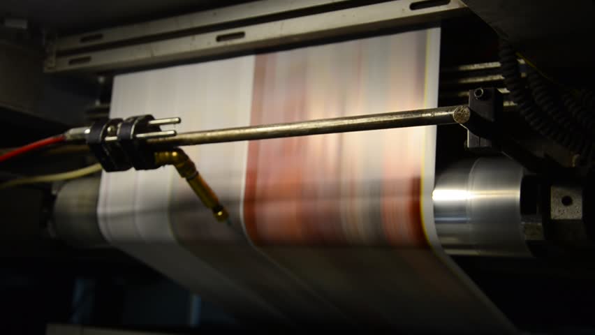 offset print press hit set roll paper goes through the rollers and is read by the color management camera, after passing the printing units