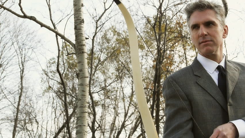 Corporate man using a bow and arrow. Two versions with and without target included, separated by a red frame.