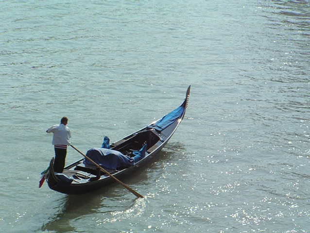 Venice: Typical Gondola boat along Grande Canal