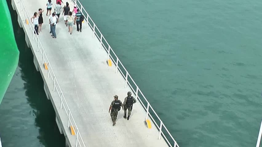 Military walking on the bridge