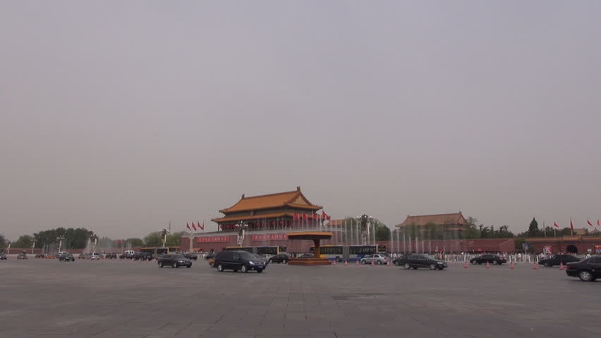 BEIJING, CHINA - APRIL 25, 2012, Fast motion of Forbidden city and car traffic in dust storm