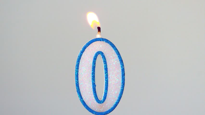 Zero candle flickering and extinguishing in slow motion