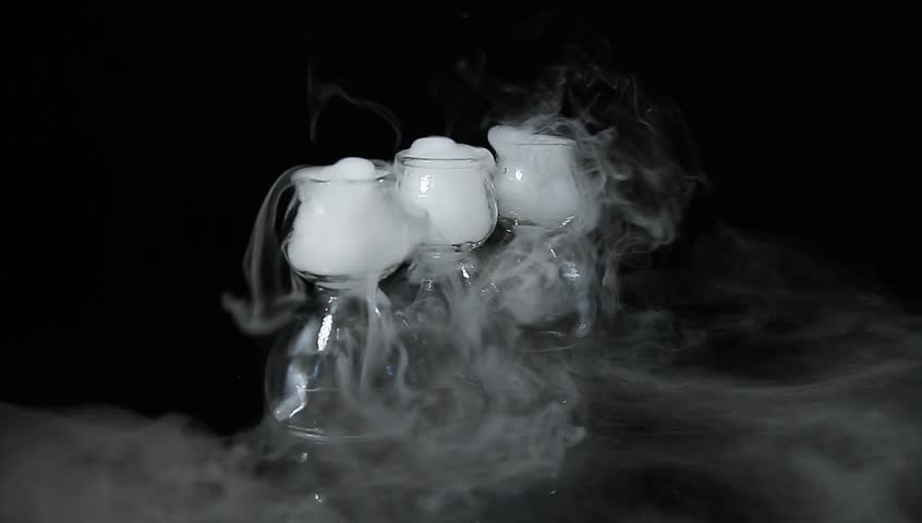 drink in glass with the effect of dry ice