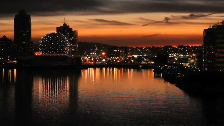 Vancouver Dawn, False Creek. False Creek and the Vancouver skyline at dawn. The geodesic dome of Science World is a local landmark. British Columbia, Canada.
