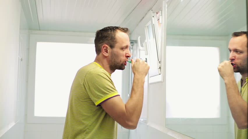 taking down bathroom mirror
