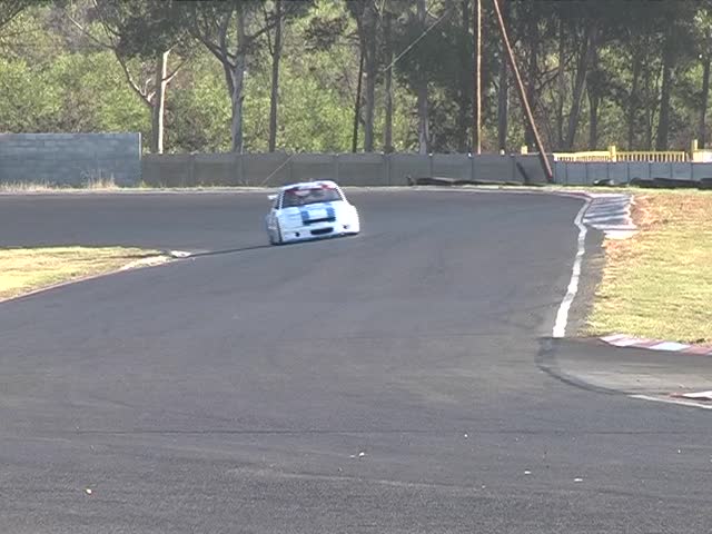 Motor racing at Kilarney in race track in Cape Town, South Africa (includes sound)