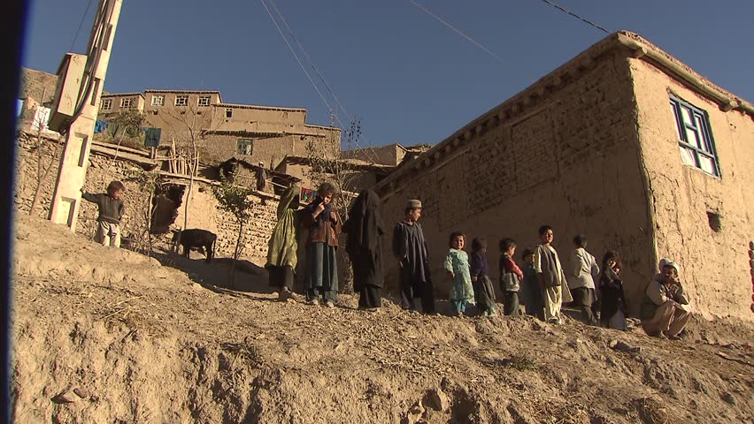 Village in Upper Yaftal, Afghanistan - November 9, 2010: Children playing and posing in a village in northern Yaftal in north-east of Afghanistan.