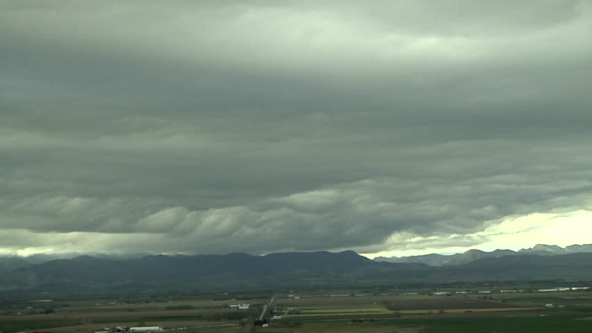 Asperatus Above Us. Stratocumulus marking the surface of a shallow cold front oscillate from gravity waves