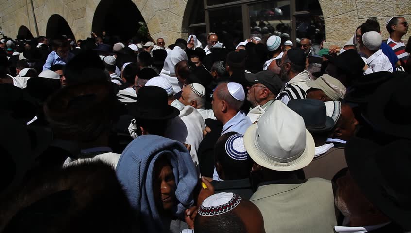 JERUSALEM, ISRAEL -  MARCH 28: Thousands of Jews practice the Priestly Blessing  (Hebrew - Birkat Cohanim) at the Western Wall plaza during the Passover Holiday, March 28 2013 in Jerusalem, Israel.