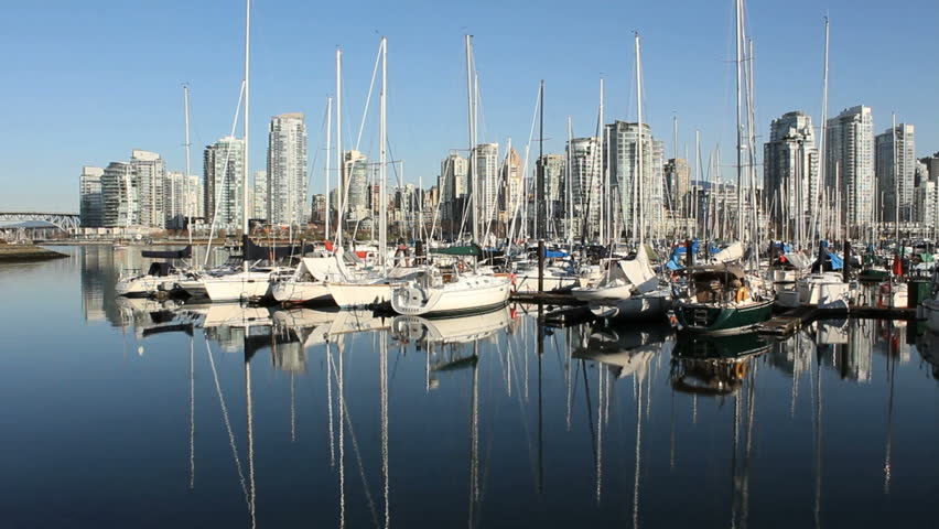 False Creek Marina Reflection, Vancouver. Reflections of a False Creek marina with the towers of downtown Vancouver in the background. British Columbia, Canada.
