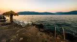 Time-lapse video of the deserted beach in Montenegro, Adriatic sea, in summer, just after the sunset