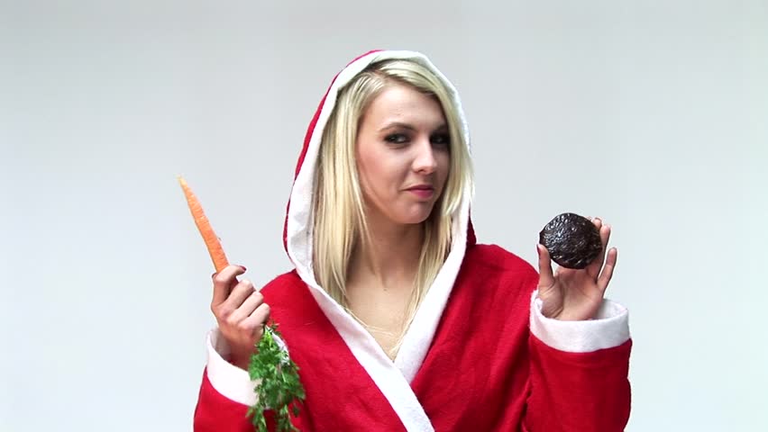 HD1080i Sexy x-mas blond girl with carrot and chocolate cake. Bad choice.
