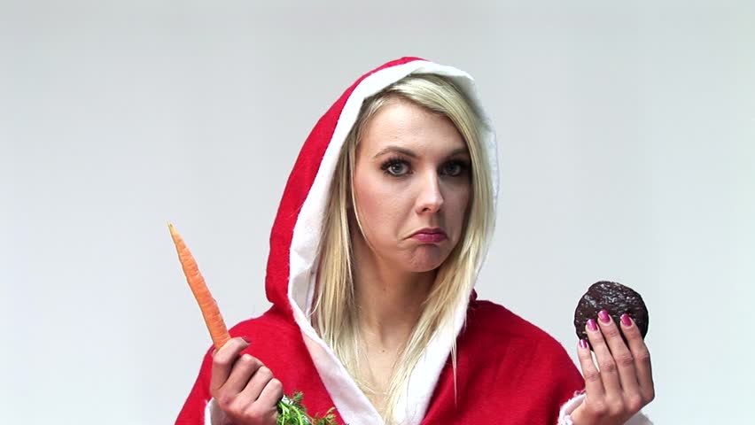 HD1080i Sexy x-mas blond girl with carrot and chocolate cake. Bad choice.