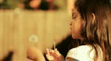 Dandelion little girl innocence Child Blowing a freedom spring childhood summer