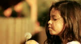 Dandelion little girl innocence Child Blowing a freedom spring childhood summer
