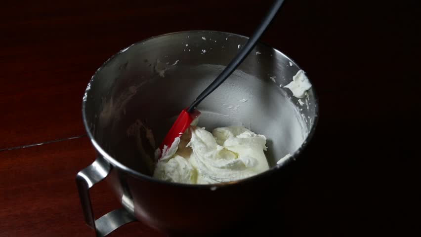 Butter cream for frosting in a steel bowl