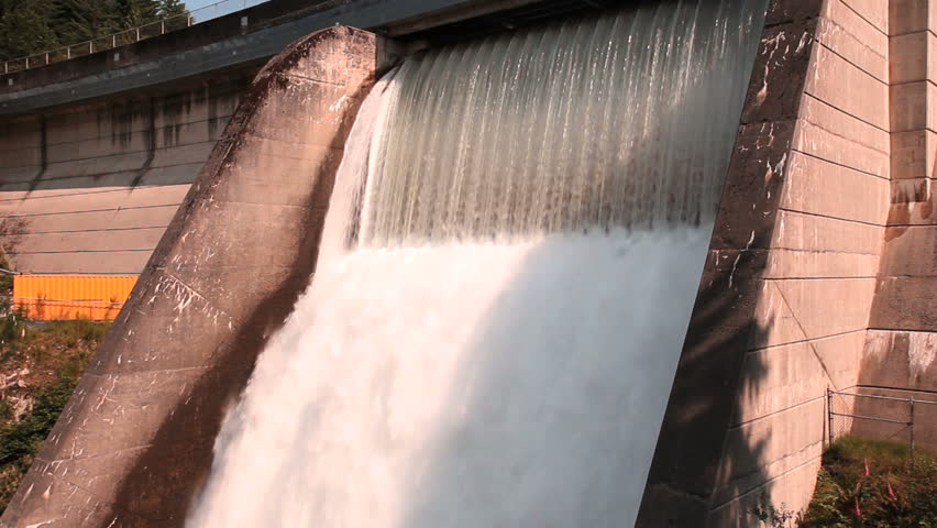 Water Over Dam Spillway. Water roaring over the spillway of the Cleveland Dam in North Vancouver, British Columbia, Canada.
