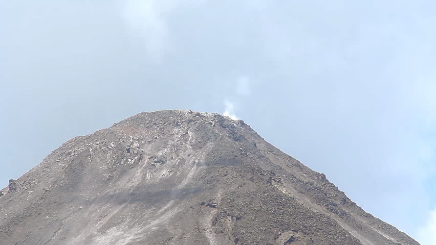 Arenal Volcano 6. The Arenal Volcano, an active volcano in Costa Rica. Heavy zoom of steam escaping the vents.