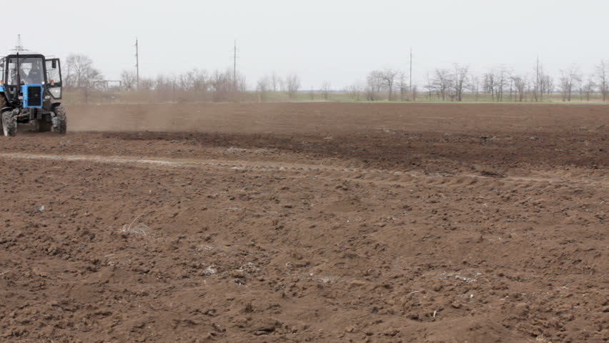 Tractor working on the filed.