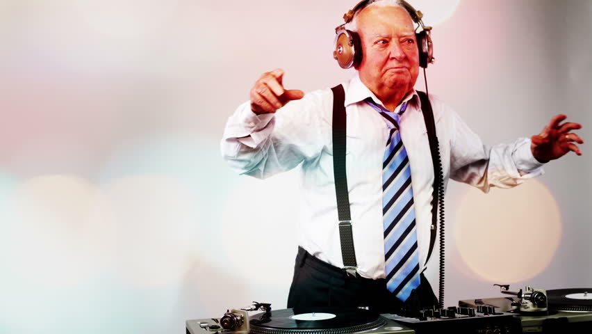 a very funky elderly grandpa dj mixing records

