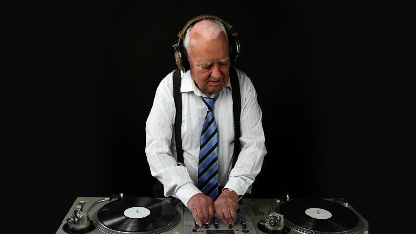 a very funky elderly grandpa dj mixing records
