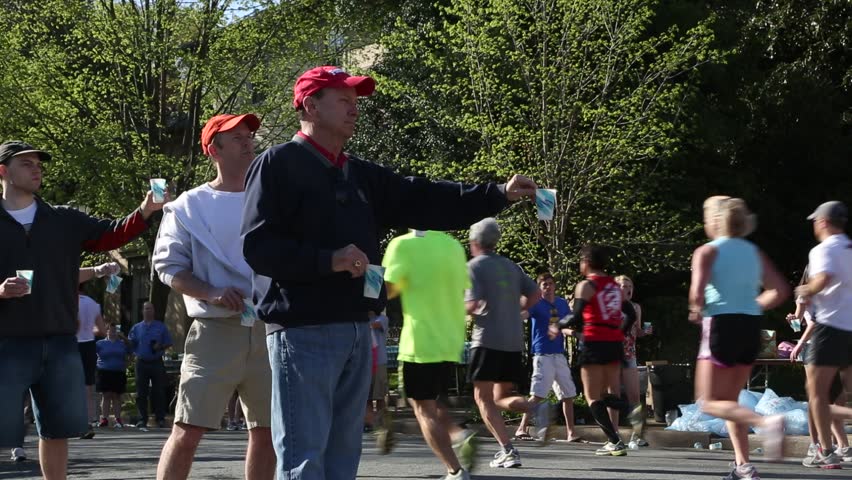 RICHMOND, VIRGINIA - APRIL 13: Runners participate in the Ukrop's Monument Avenue 10k race presented by Martin's on April 13, 2013.