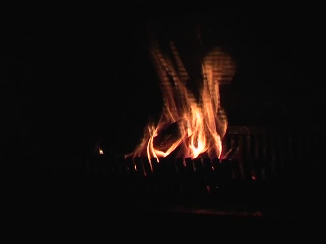 Small fire in a hearth on a winters day