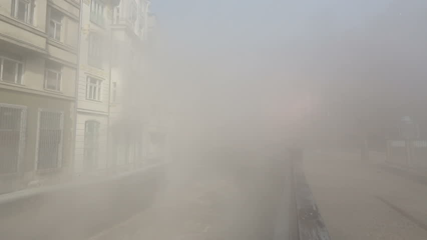 view of the city of Karlovy Vary in the Czech Republic, smoke on the water