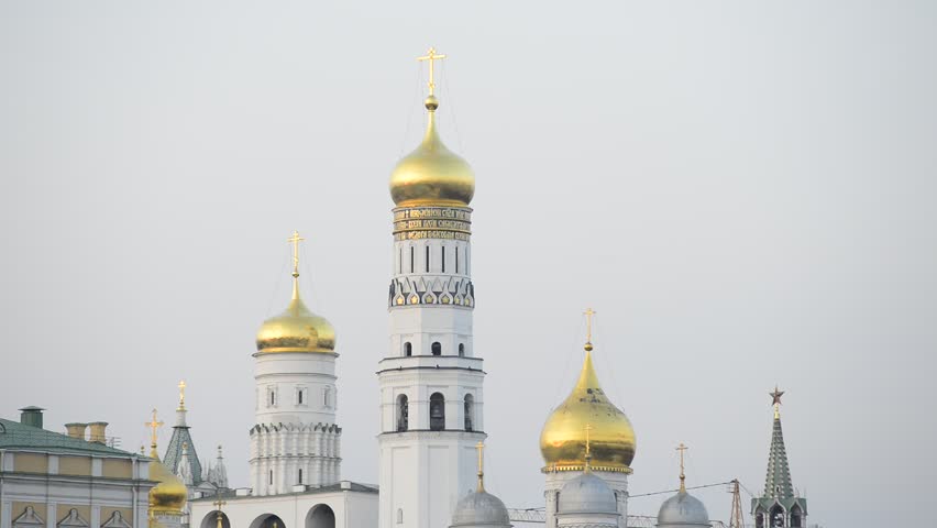 Moscow Kremlin, view on The Water Supplying (Vodovzvodnaya) Tower, Grand Kremlin Palace and Ivan the Great Bell Tower: slide from the bottom to the top and back