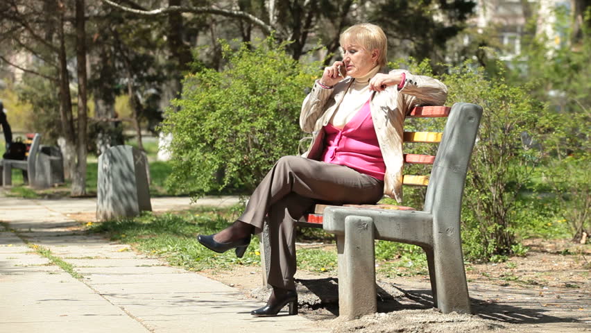 Happy Senior Woman On The Phone