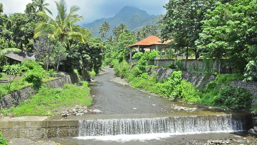 drain chanel/ storm sewer in Bali Indonesia with waterfall of the last rain