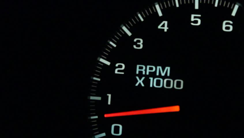Dashboard RPM gauge revs up from an idle at 500 up to 6000 and back down again.