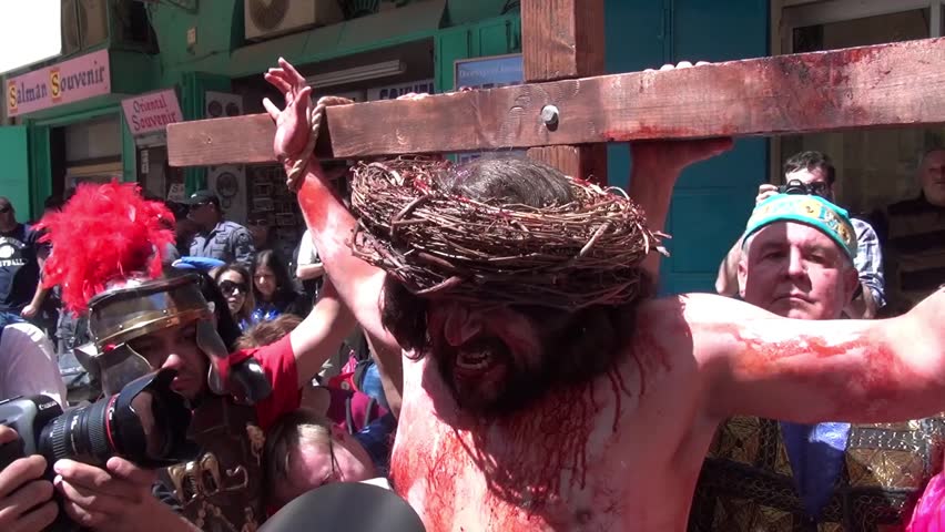 JERUSALEM-MARCH 29: Catholic Holy Friday - a group of actors depicting the crucifixion of Christ near Holy Sepulcher in Old City Jerusalem, Holy Friday March 29, 2013 in Jerusalem, Israel