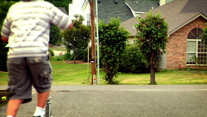 Boy on Scooter - 1920x1080 HD