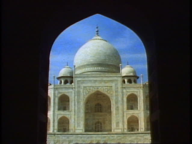The Taj Mahal, Agra, India, close-up of the central dome framed in an archway
