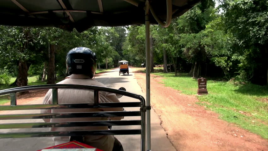 road trip in Siem Reap with one of traditional means of transport, tuk-tuk / tuk-tuk tour in Cambodia 